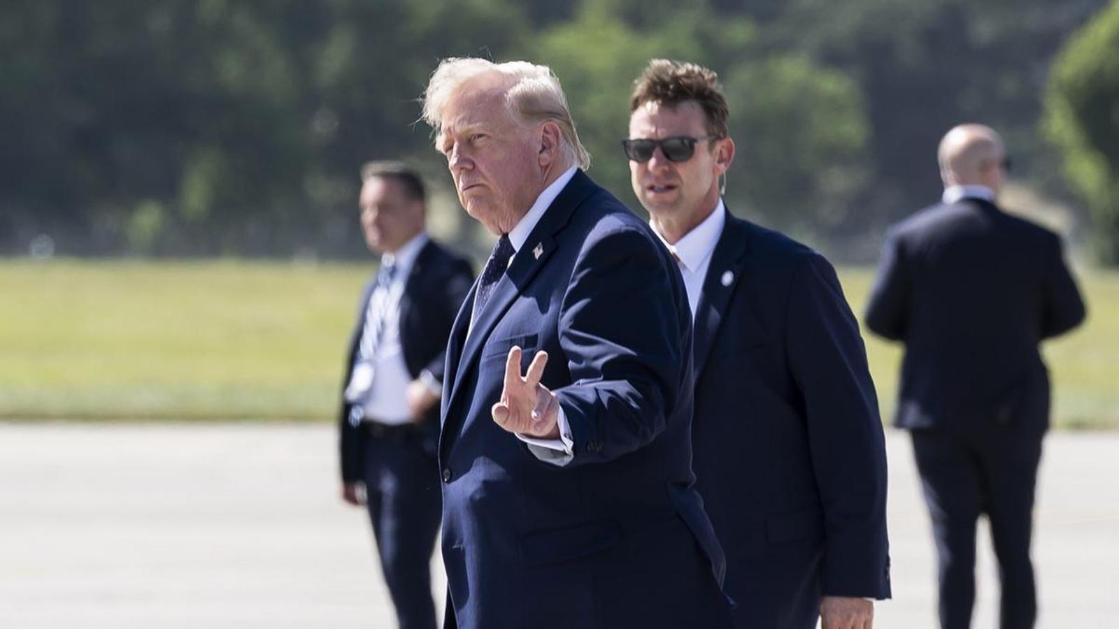 Donald Trump arrives at Geneva airport on June 15 to attend the G7 summit.