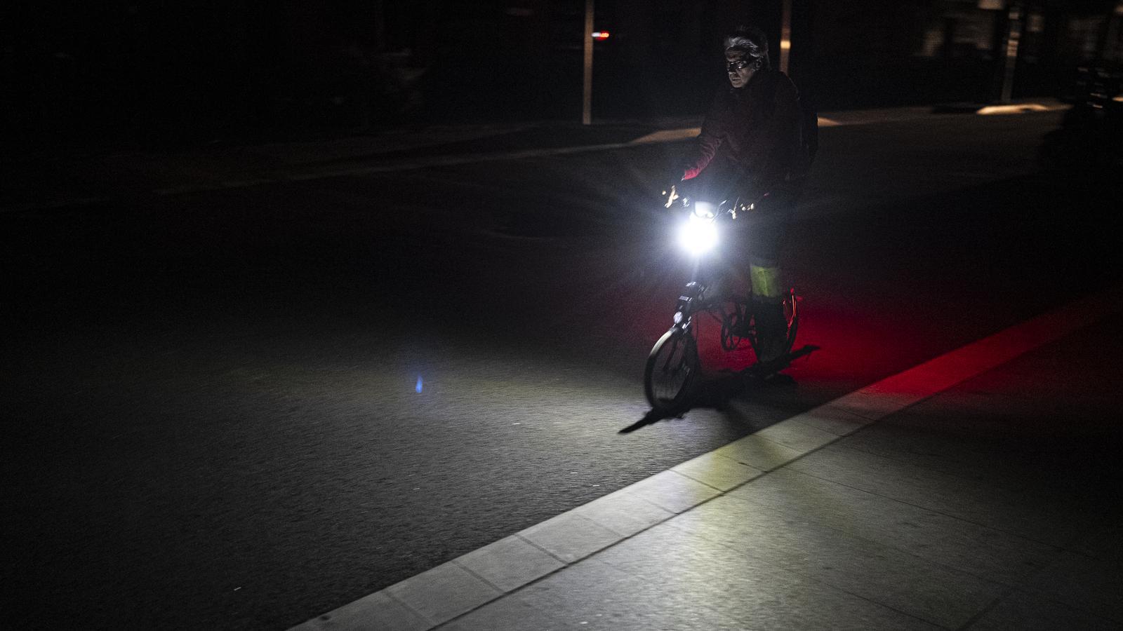 A young person on a bicycle on the day of the blackout