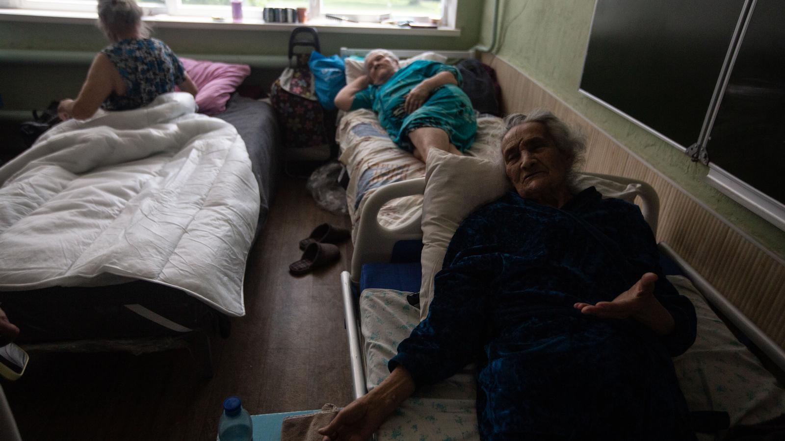 Refugees from the Donbas region at the transit center for displaced persons in Lozova, Kharkiv region.