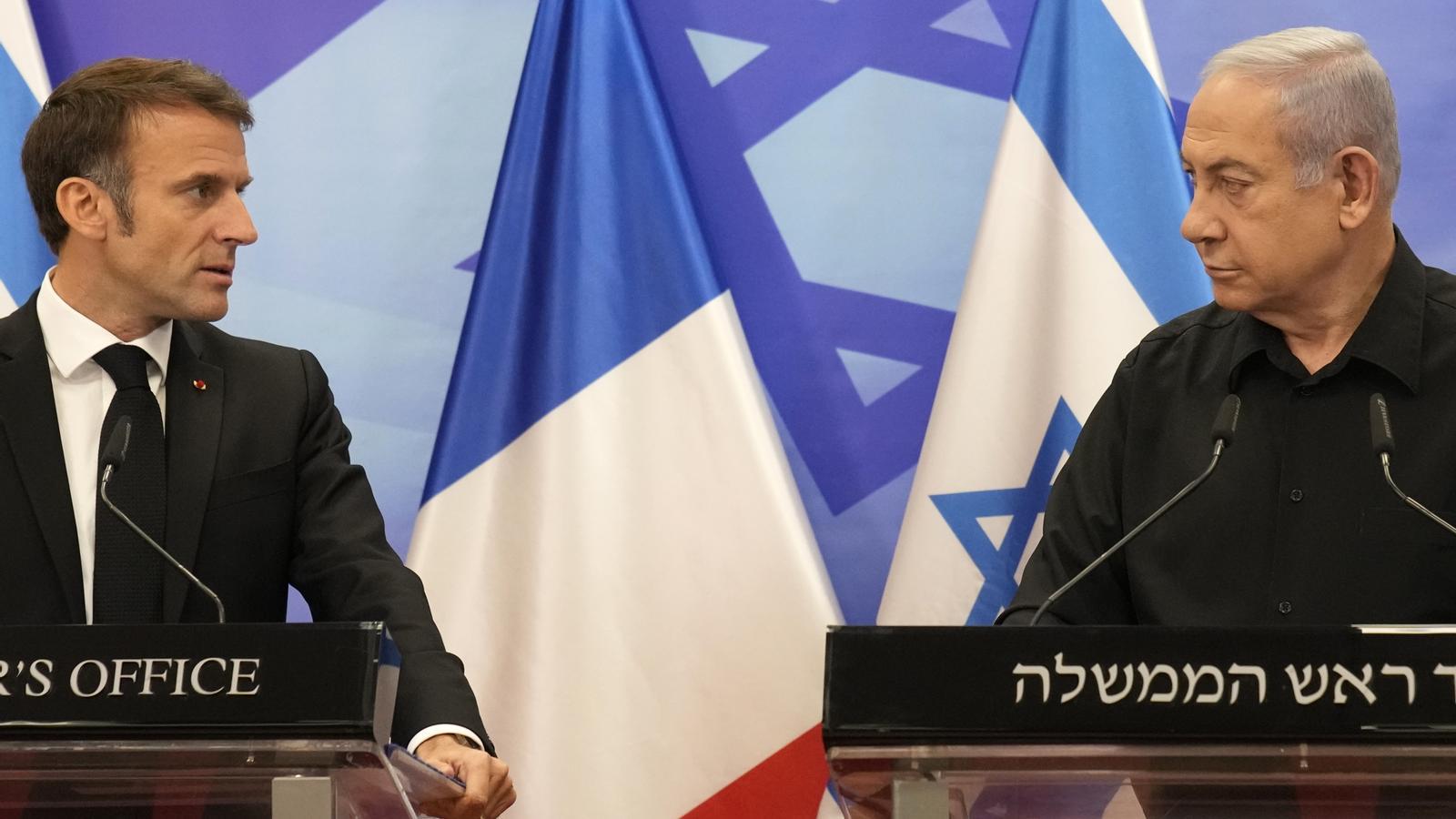 El presidente francés, Emmanuel Macron, y el primer ministro israelí, Benjamin Netanyahu, comparecieron hoy tras reunirse en Tel Aviv