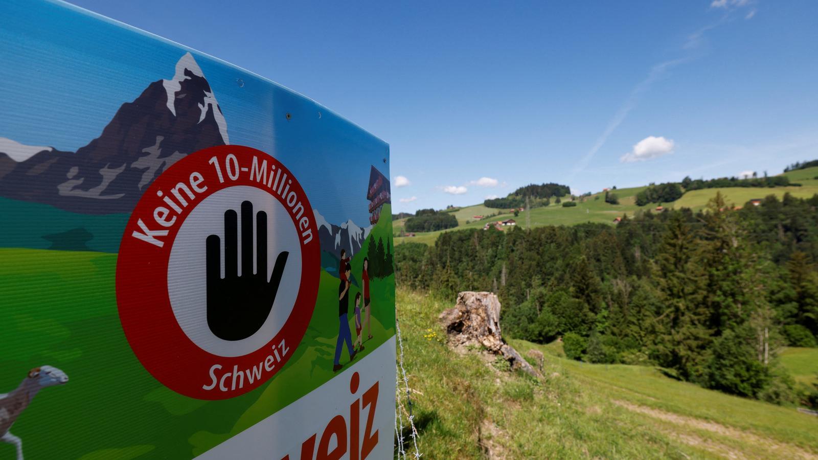 A poster about the referendum to limit Switzerland's population growth to 10 million inhabitants.