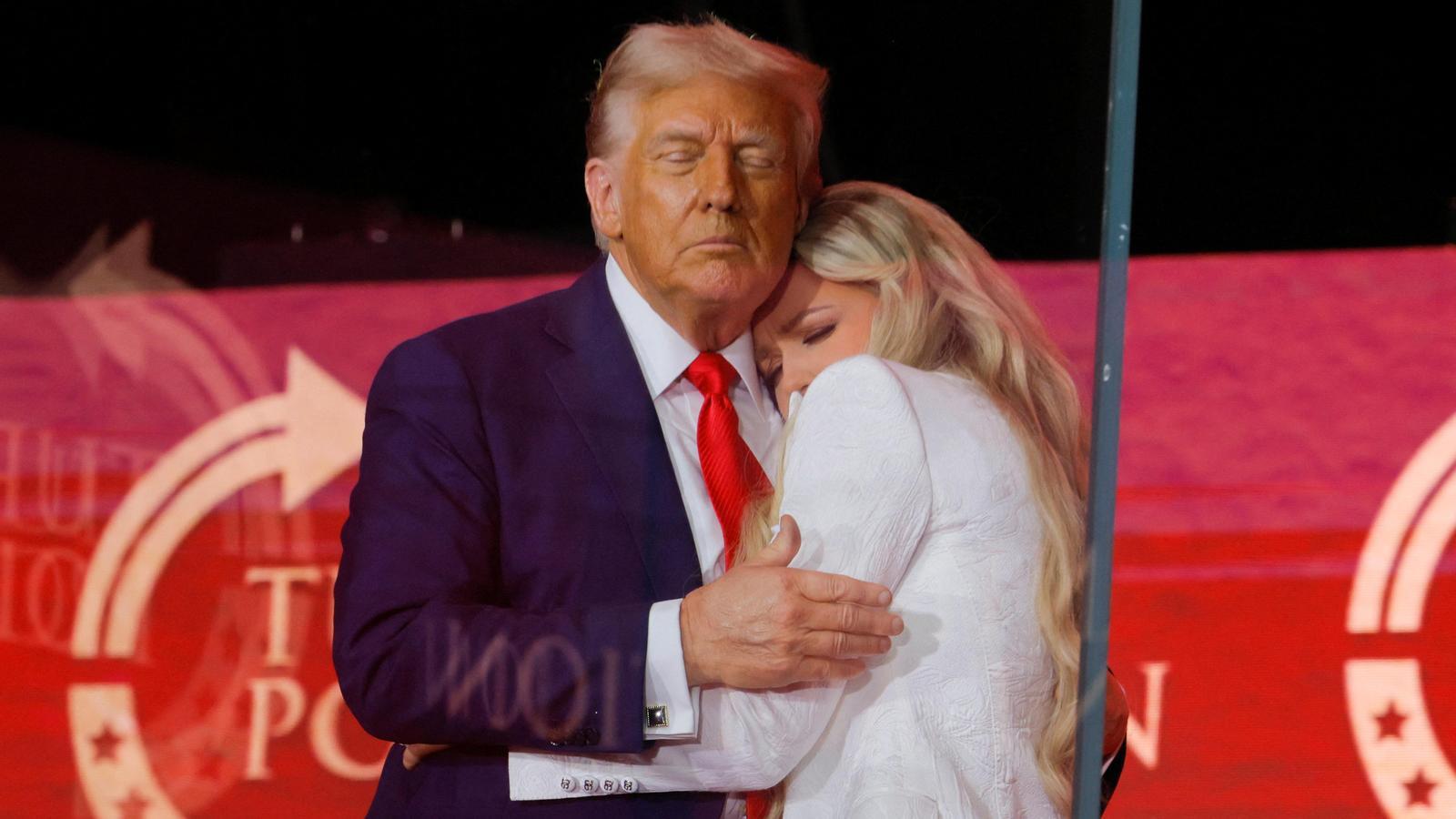 Donald Trump hugs Erika Kirk