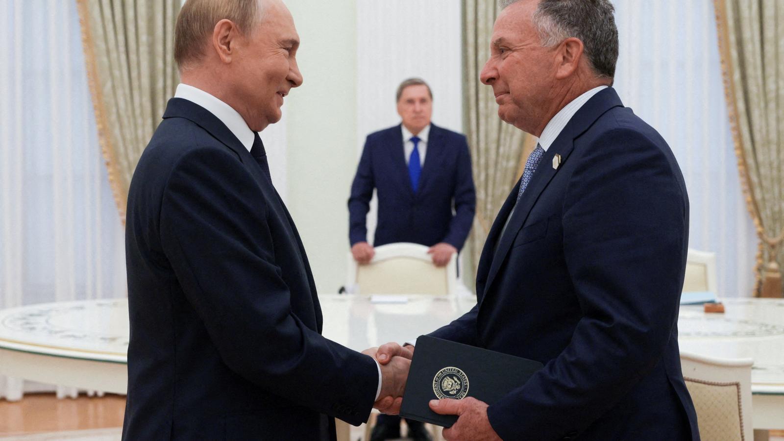 Russian President Vladimir Putin and US Special Envoy Steve Witkoff greet each other in the Kremlin.