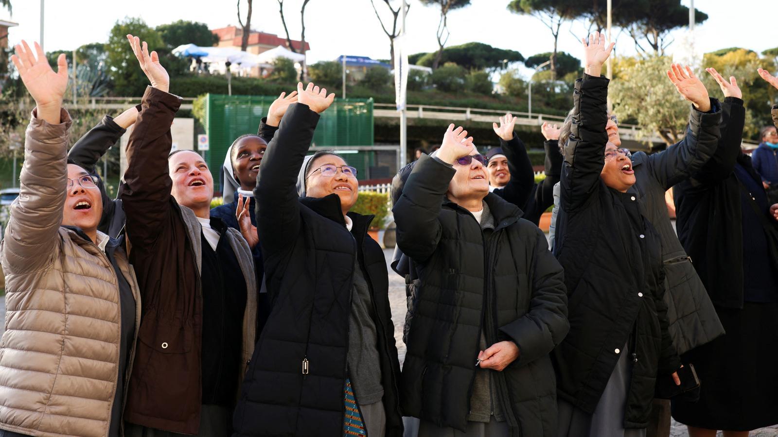 Nuns outside Rome's Gemelli hospital, where Pope Francis is hospitalized.
