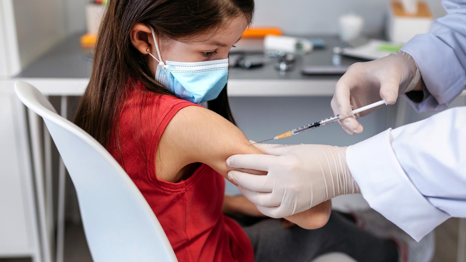 A girl receiving a vaccination