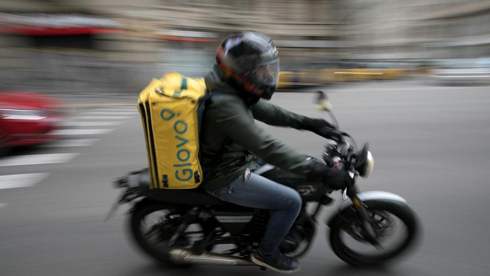 Glovo delivery man on a motorcycle