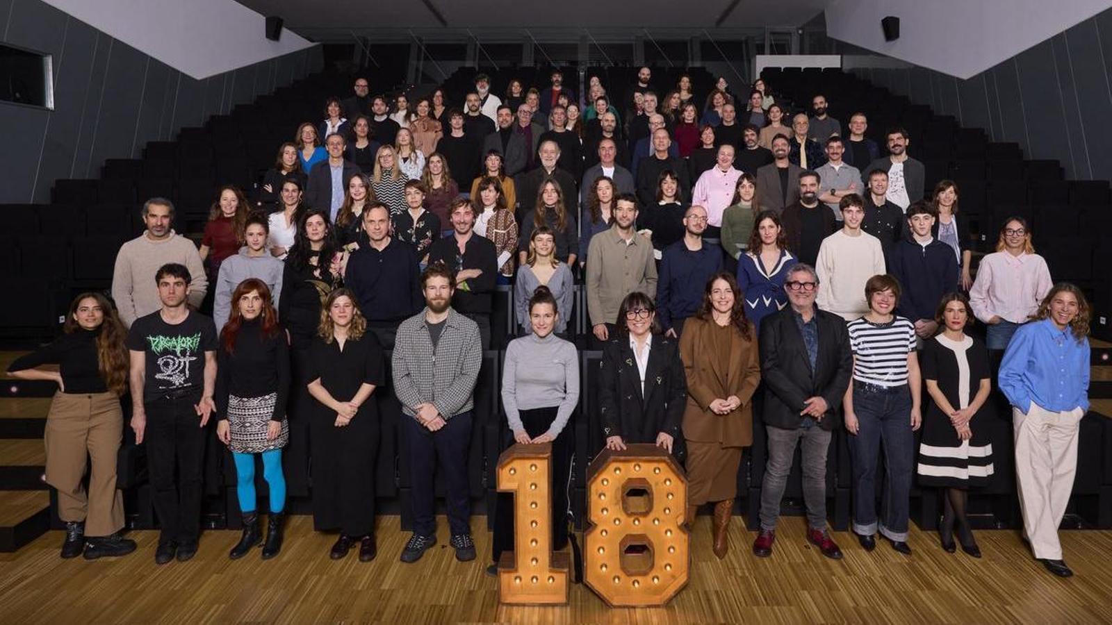 Family photo of the nominees with the Gaudí Awards.
