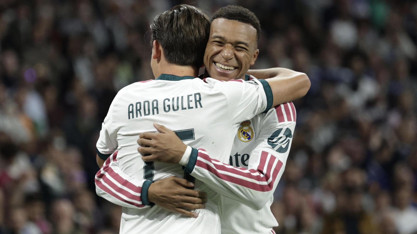 Arda Güler celebrates his goal against Leipzig with Kylian Mbappé