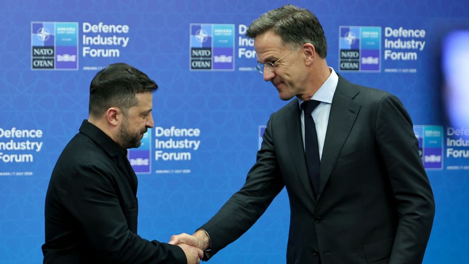 The president of Ukraine, Volodymyr Zelensky, greeting the Secretary General of NATO, Mark Rutte, during the first day of the military alliance's Ankara forum.