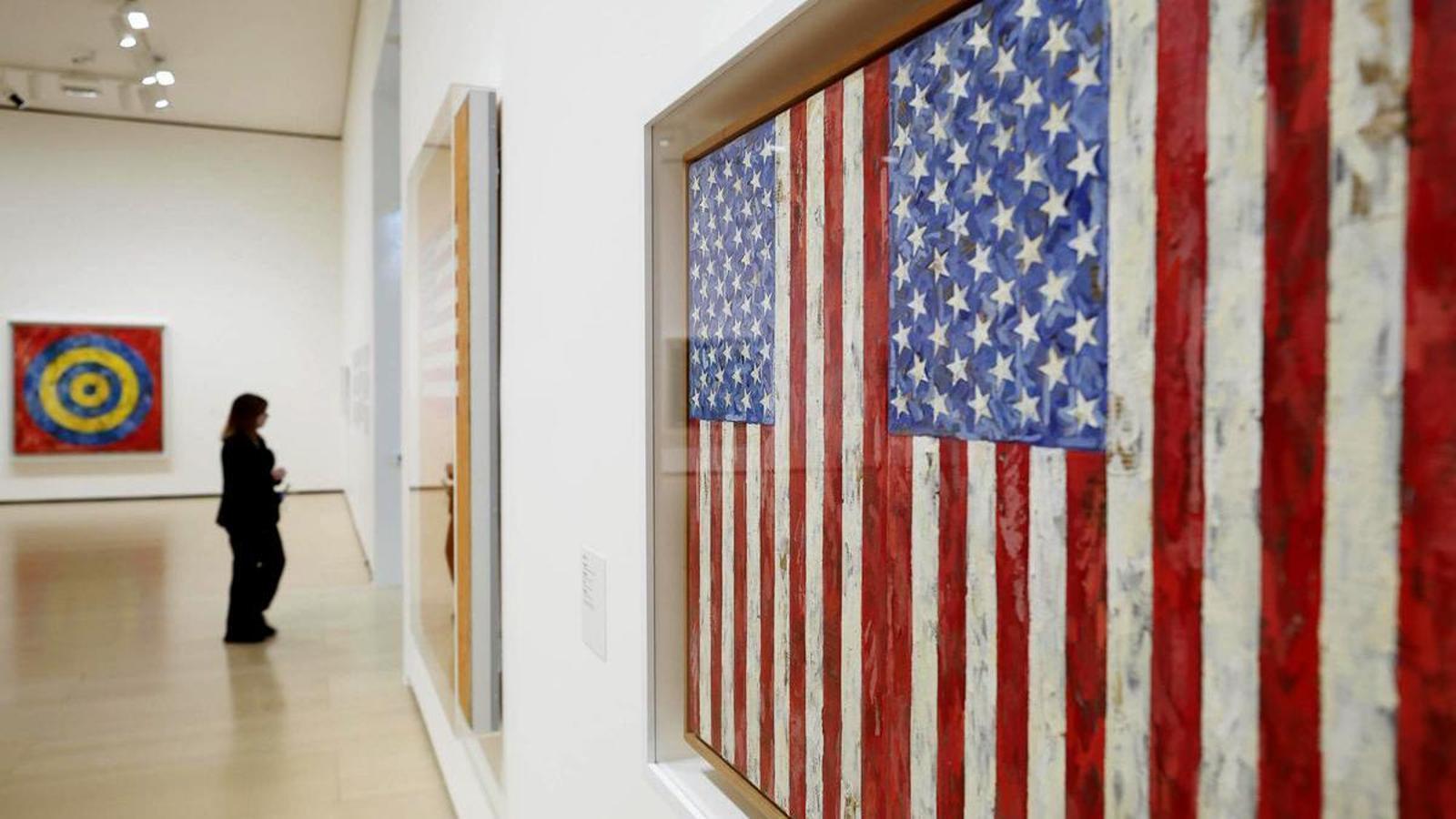 'Flags' (on the right), by Jasper Johns, inside the exhibition dedicated to him by the Guggenheim Museum Bilbao.