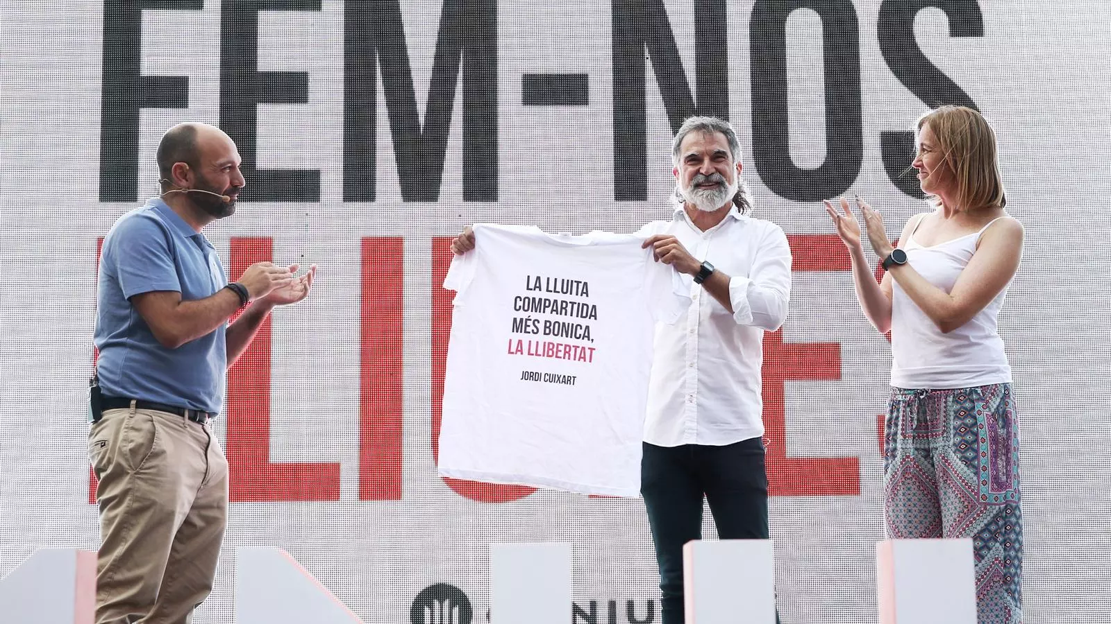 Jordi Cuixart junto a Marcel Mauri en el acto de Òmnium en Barcelona