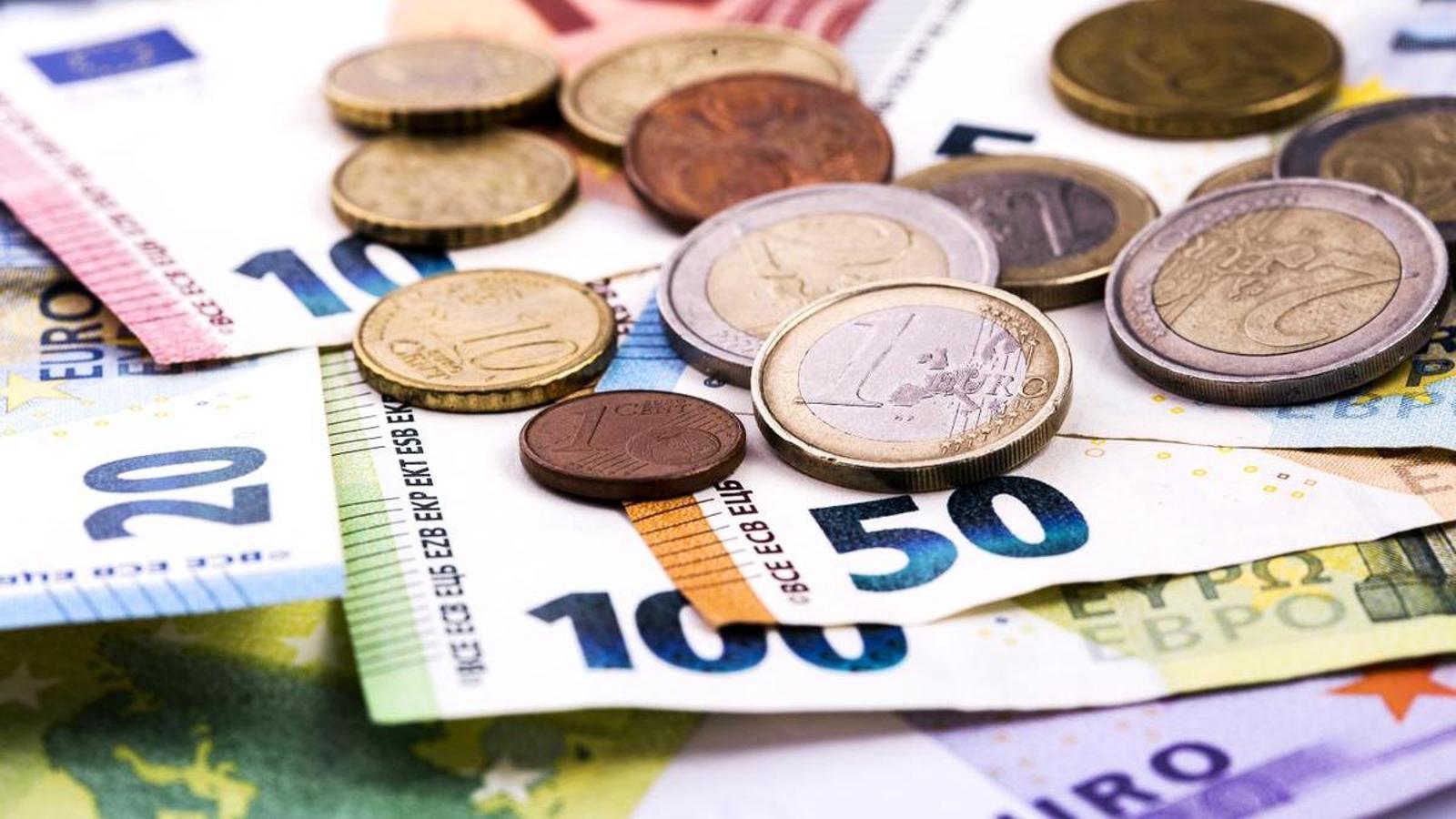Euro coins and banknotes.