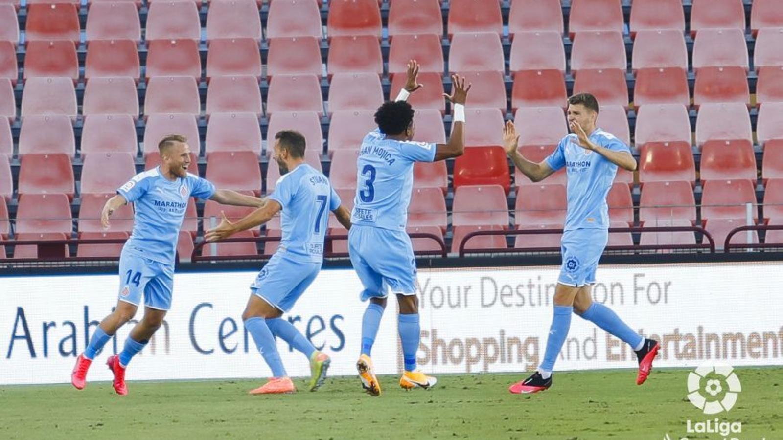 Els jugadors del Girona celebrant un dels gols a Almeria