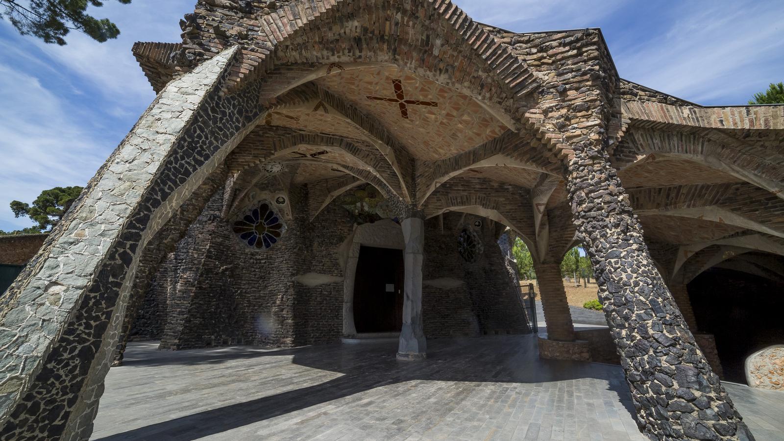 The entrance to the crypt of Colonia Güell, a modernist work by Antoni Gaudí, built between 1908 and 1915