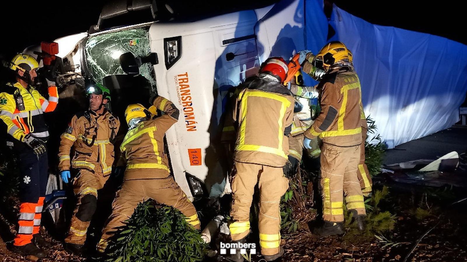 The firefighters working on the accident.