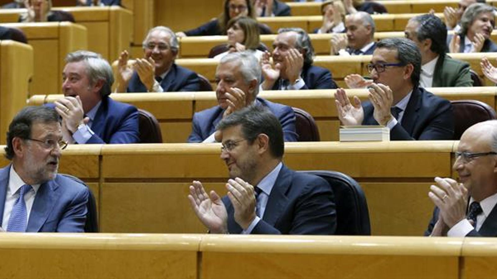 Rajoy, Catalá i Montoro durant la sessió de control al Senat. EFE