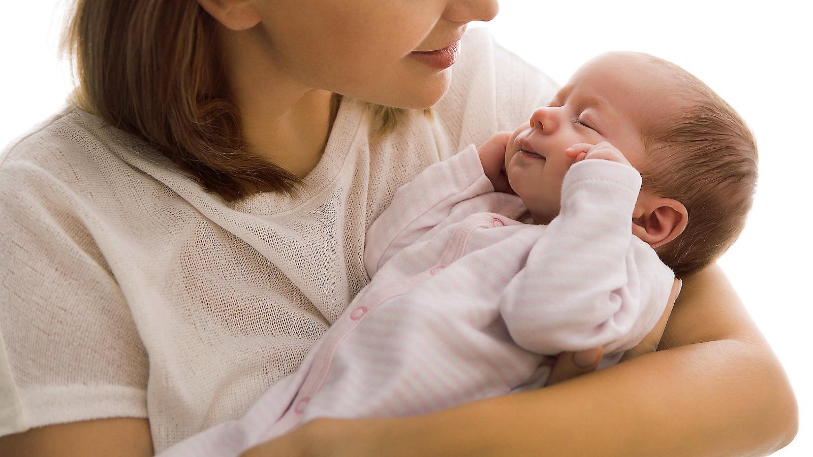 What do babies' smiles mean?