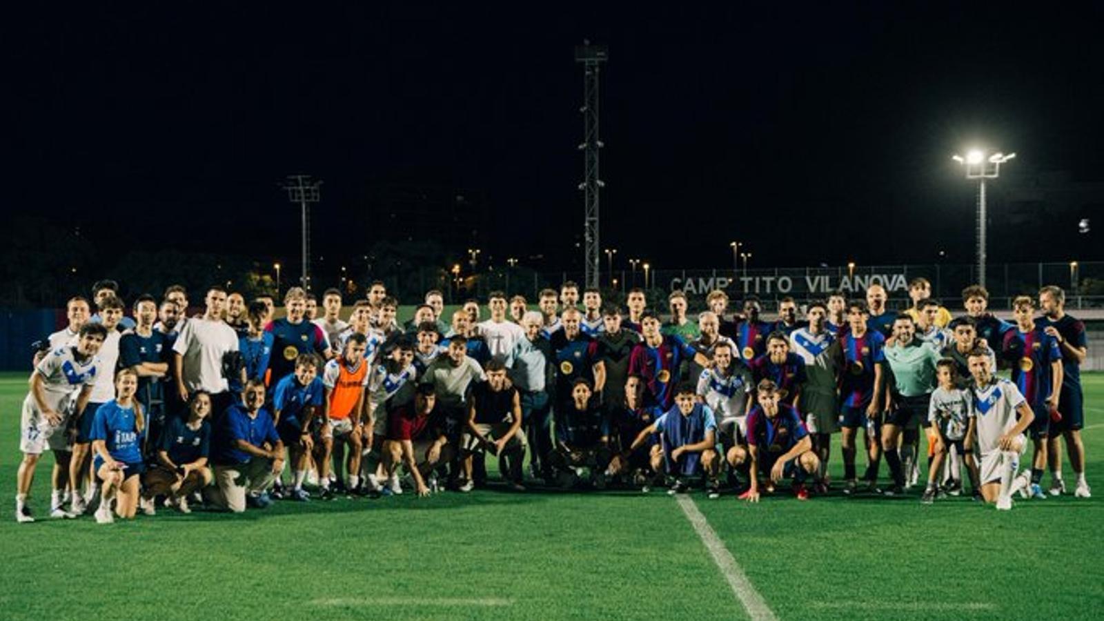 Group photo of the Barça and Europa players, who played a friendly match at the Ciutat Esportiva
