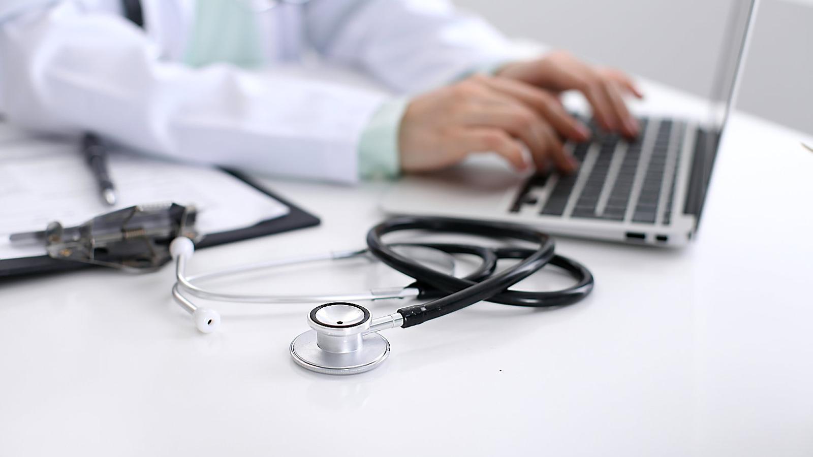 A medical consultation in a stock photo.