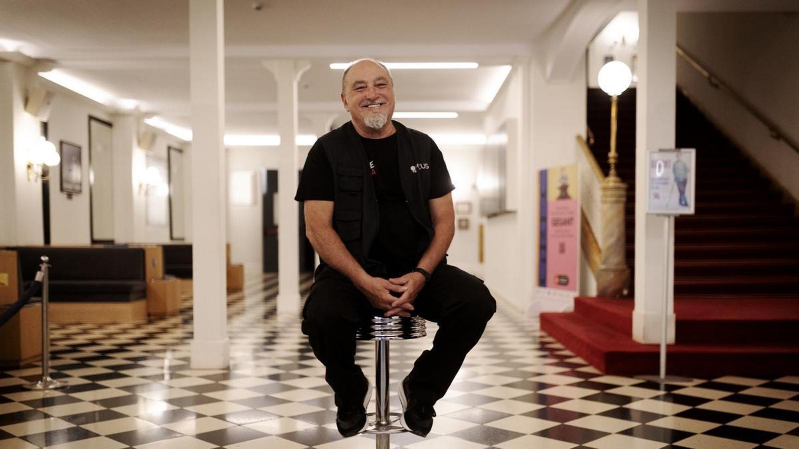 Juan Máñez in the lobby of the Romea Theatre, where he has his office and where he welcomes audiences.