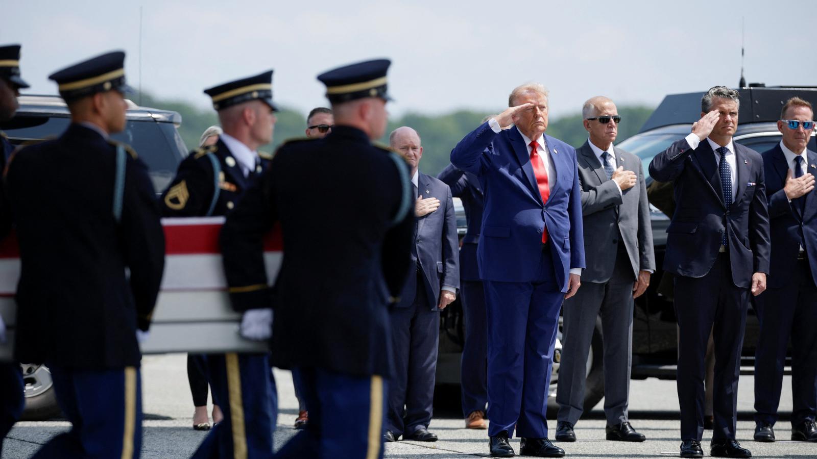 Trump receives the remains of the soldiers at Dover Air Force Base
