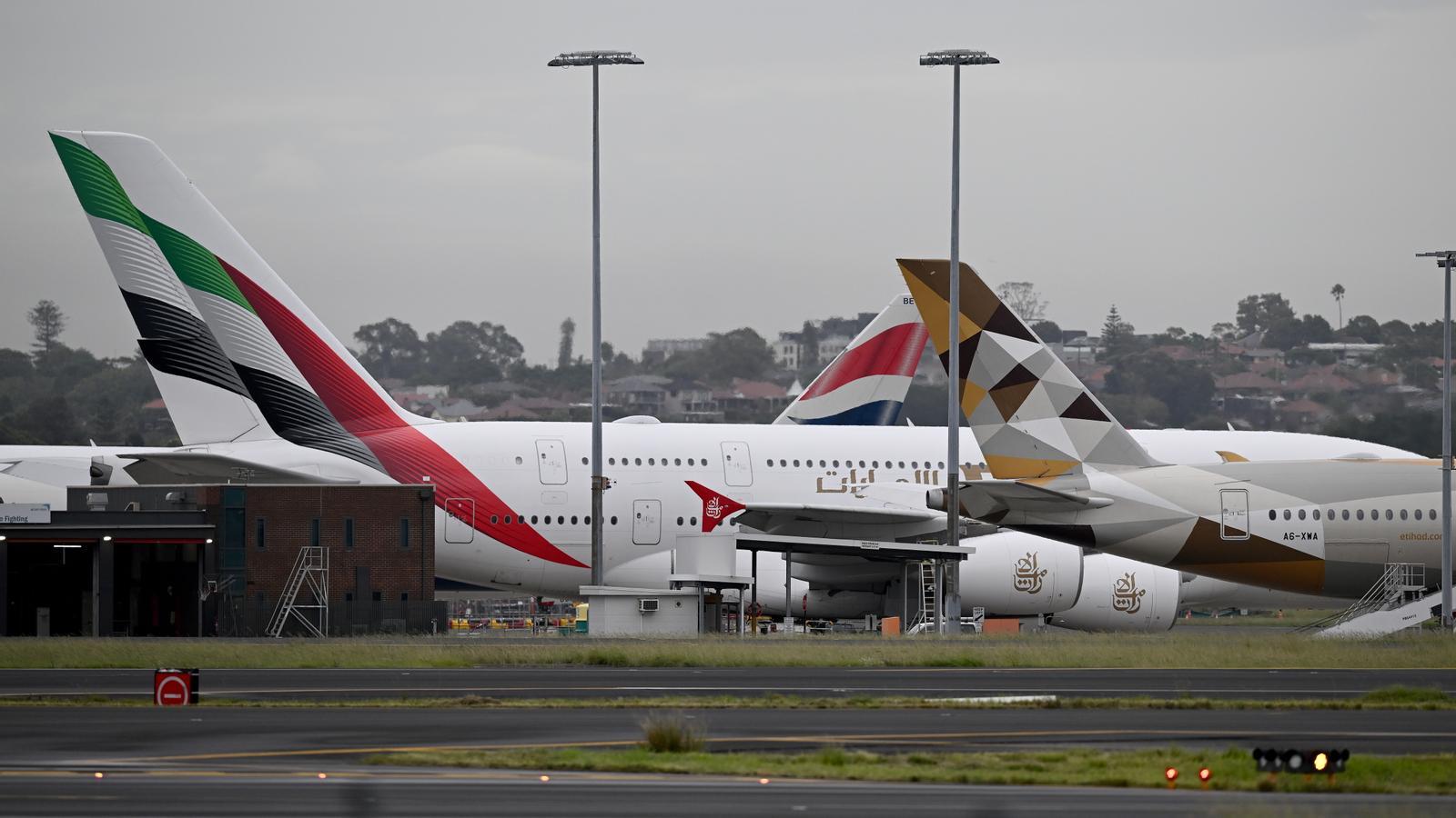 Aviones de Emitares Airlines y Etihad Airways en el aeropuerto de Sídney.