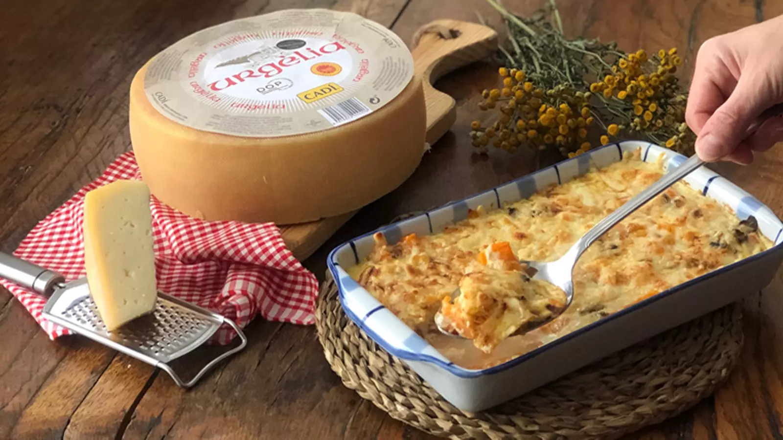 Gratén de carbassa amb camagrocs i formatge Urgèlia DOP