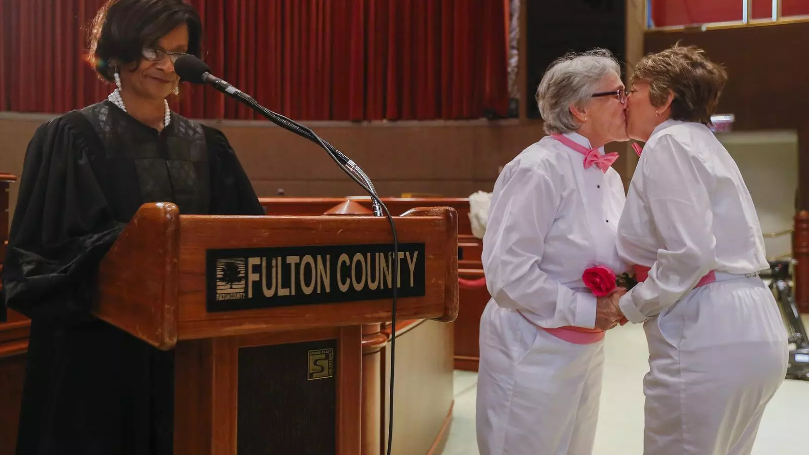 Ulia Troxler kisses her new wife Barbara Schwartz after their wedding in Atlanta, in a file photo.