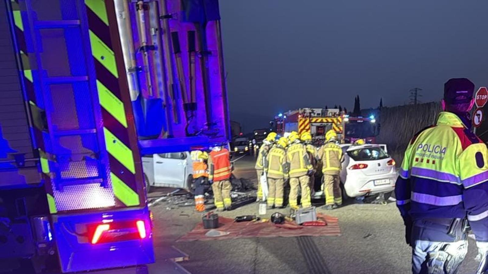 Firefighters are working at the accident site.