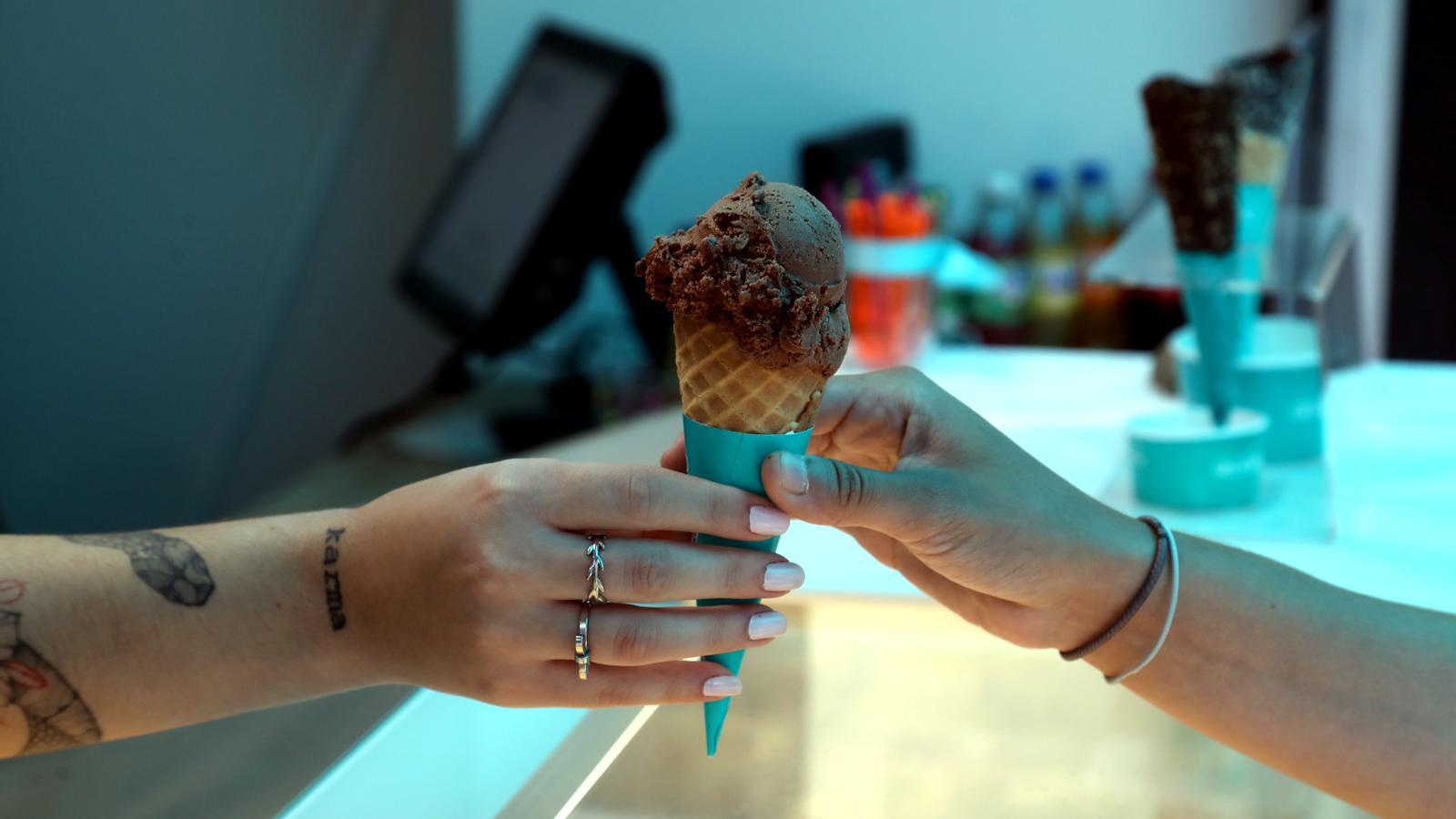 A customer buys an ice cream.