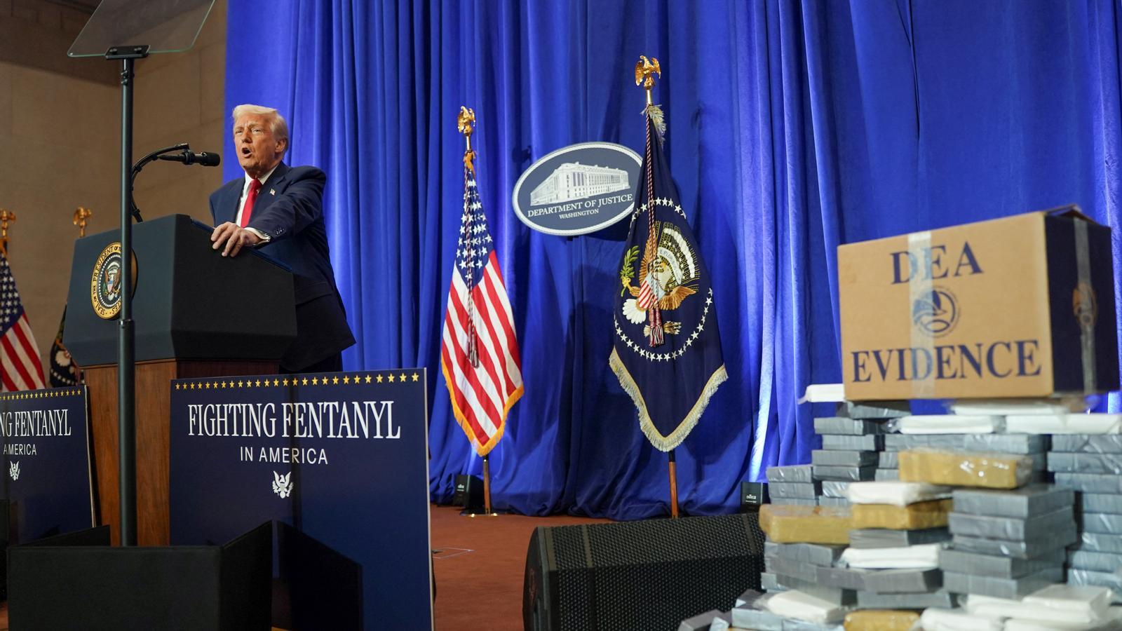 U.S. President Donald Trump addresses employees at the Department of Justice during his visit in Washington.