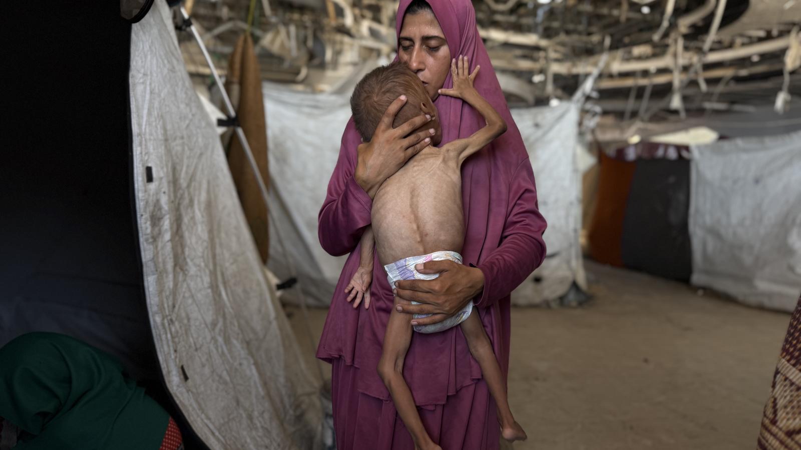 Hidaya al Makod, with her son Mohamed in Gaza City,