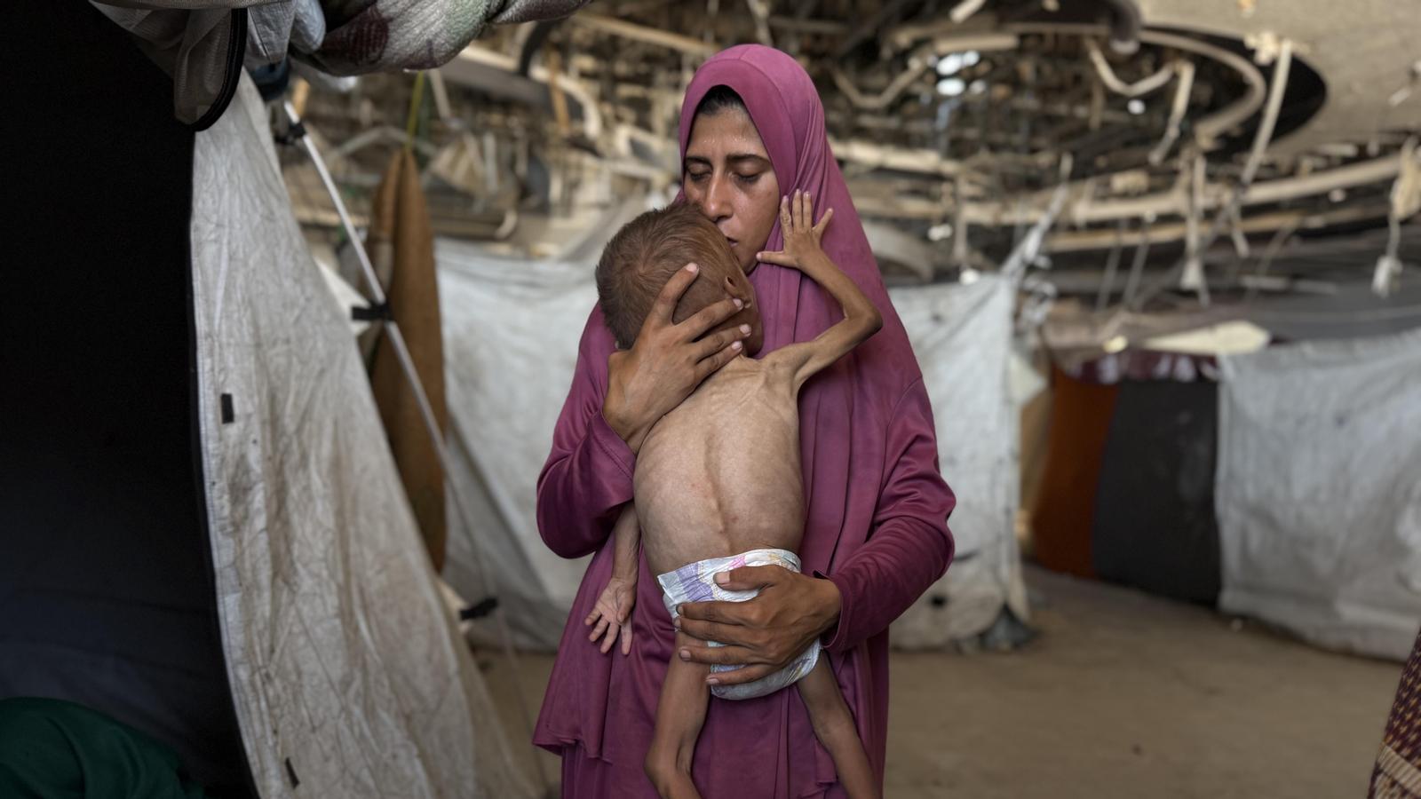 Hidaya al Makod, with her son Mohamed in Gaza City,