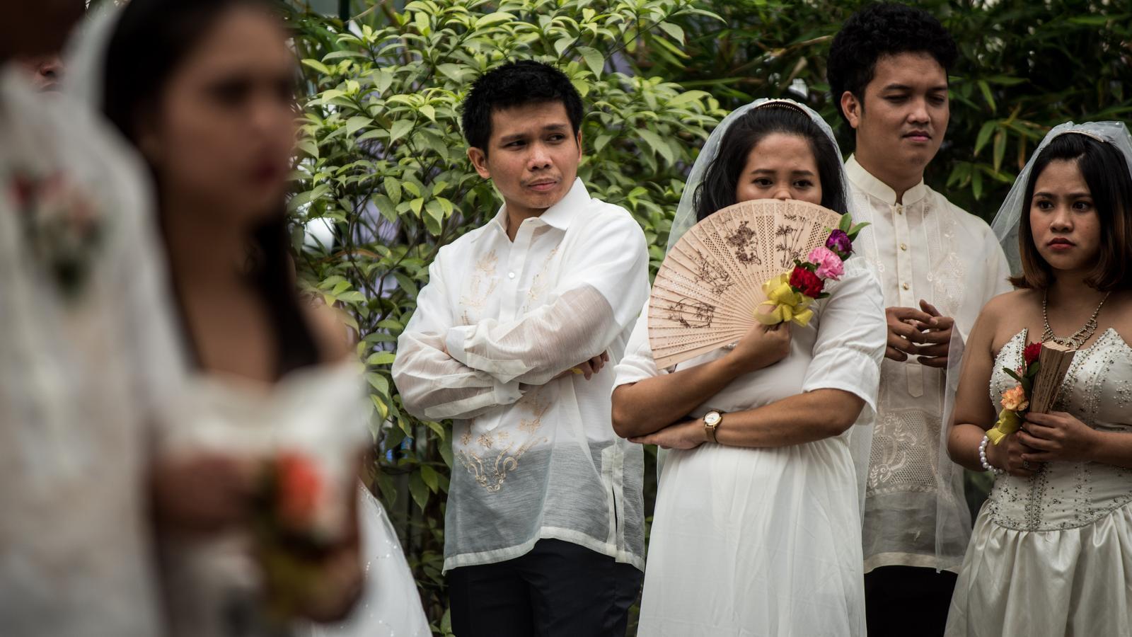 Couples await their turn to marry in the Philippines, in a file photo.