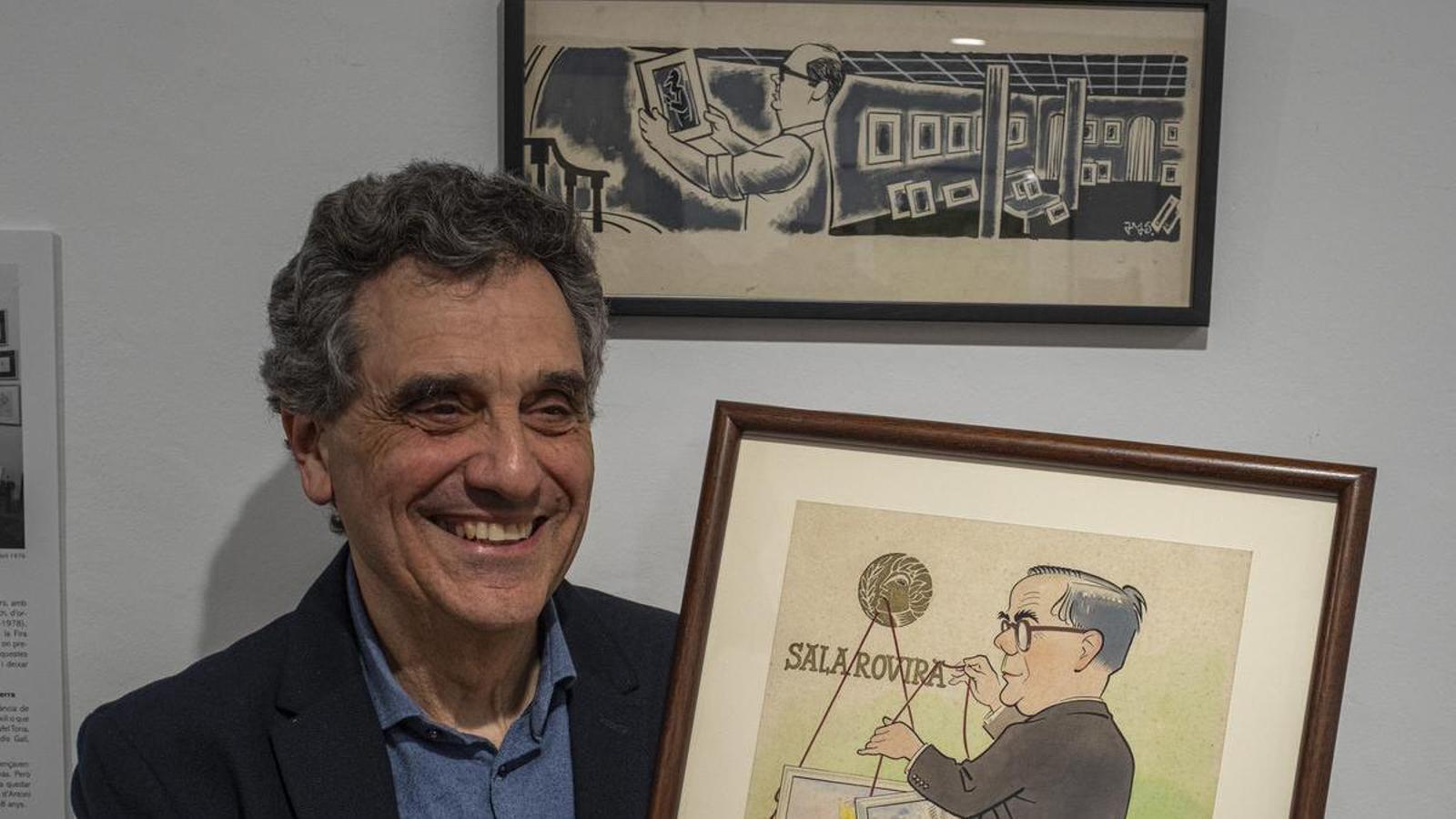The gallery owner Segimon Rovira and the portraits of the father and grandfather