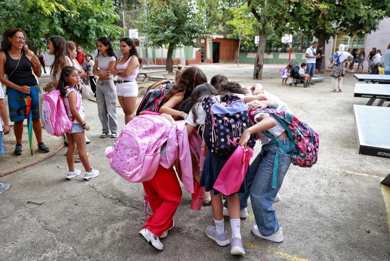 Students arriving at school on the first day