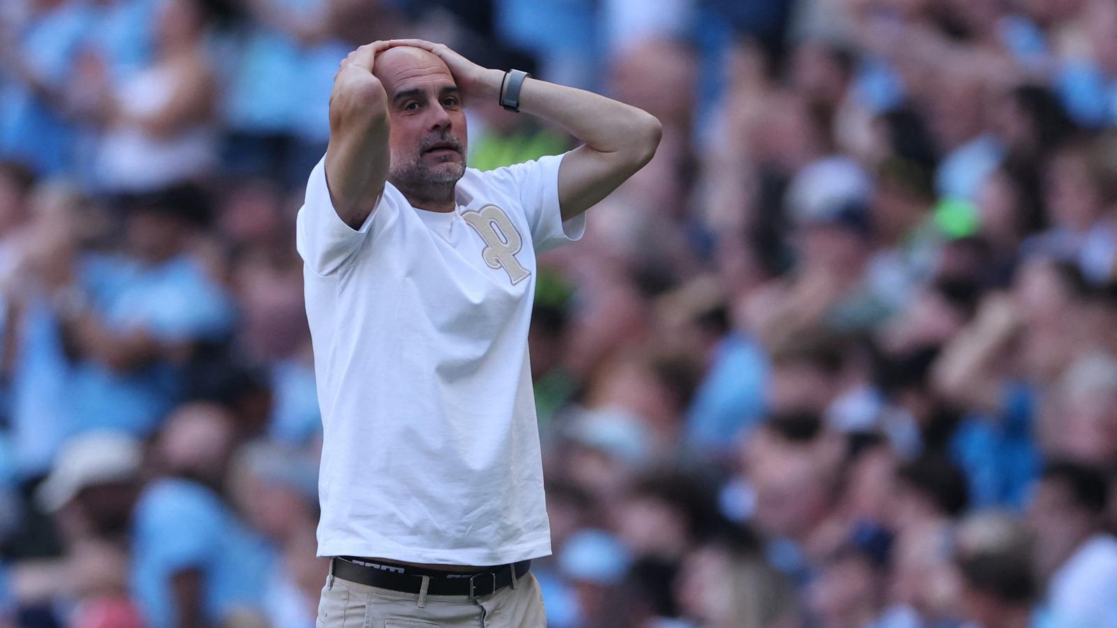 Pep Guardiola, putting his hands on his head in his last match on the Manchester City bench