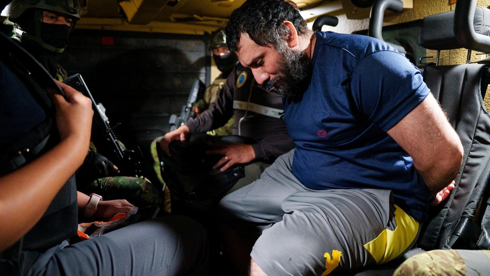 Drug trafficker 'Fito' being captured on June 26, in an image provided by the Ecuadorian army.