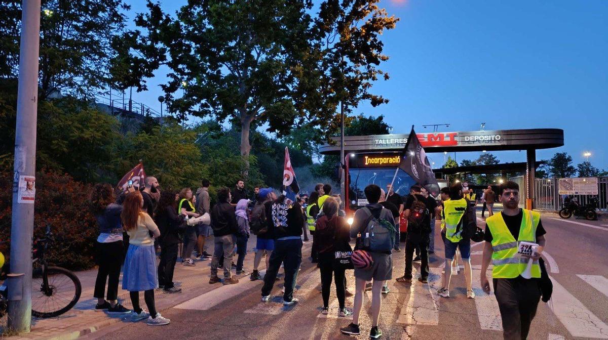 A picket line at a transportation facility, symbolizing labor disputes.