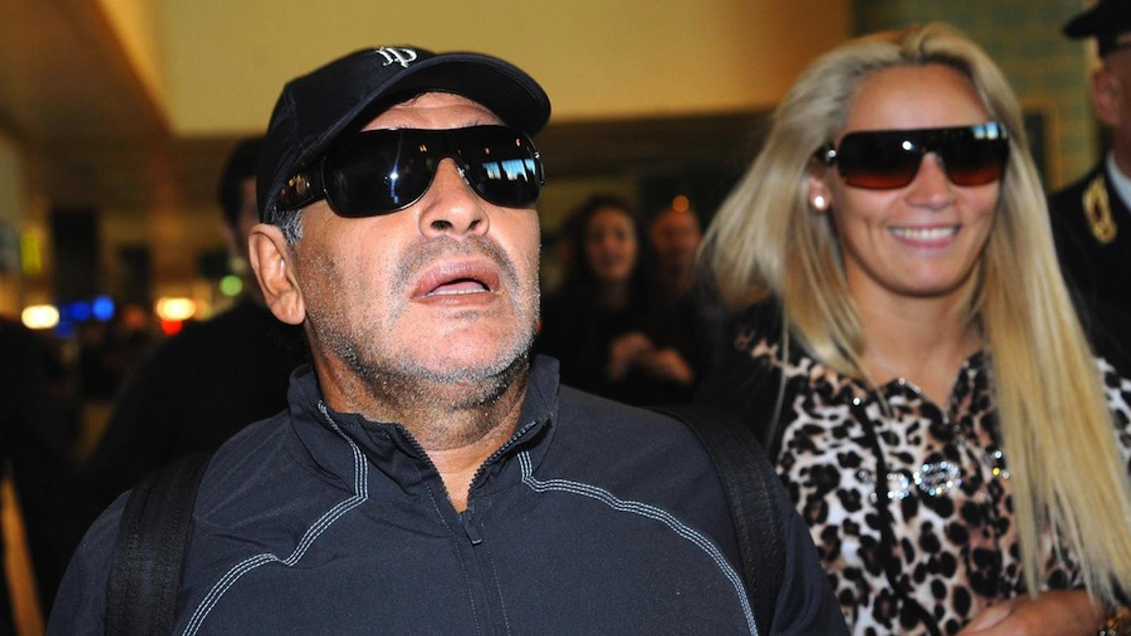 Diego Armando Maradona, upon his arrival at Milan airport with his girlfriend Rocío