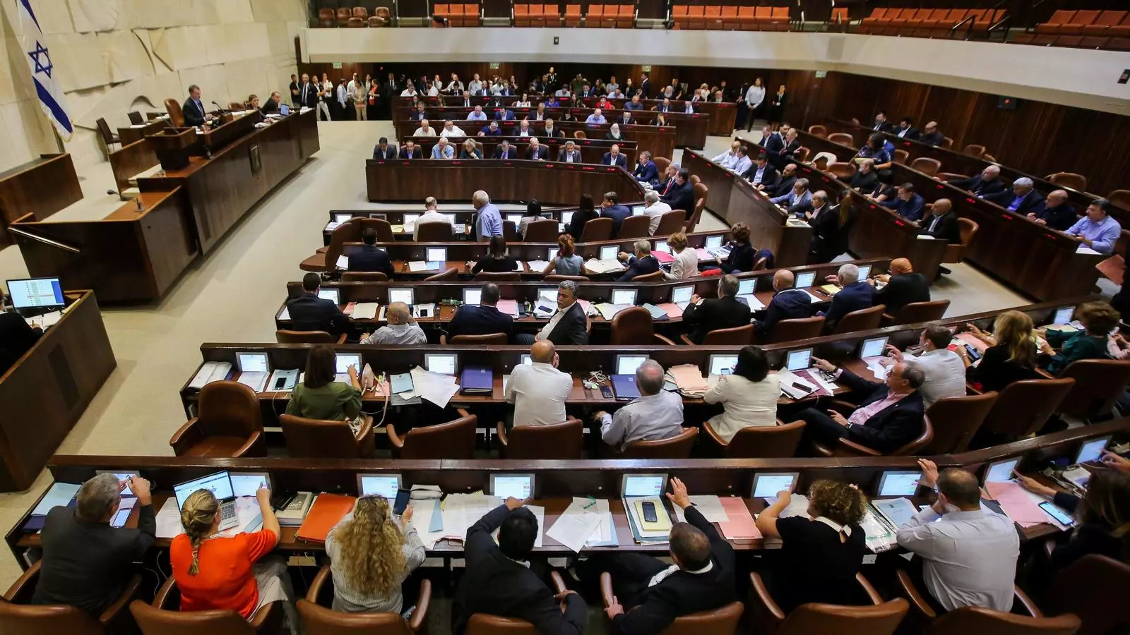 Els membres del Parlament israelià durant la sessió que ha aprovat la nova llei
