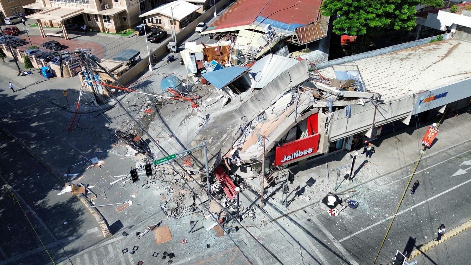 A drone image shows a collapsed building after a magnitude 7.8 earthquake on the island of Mindanao, in the Philippines.