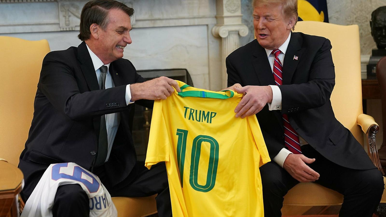 Jair Bolsonaro gave Donald Trump a Brazilian national soccer team jersey with his name and Pelé's number 10.