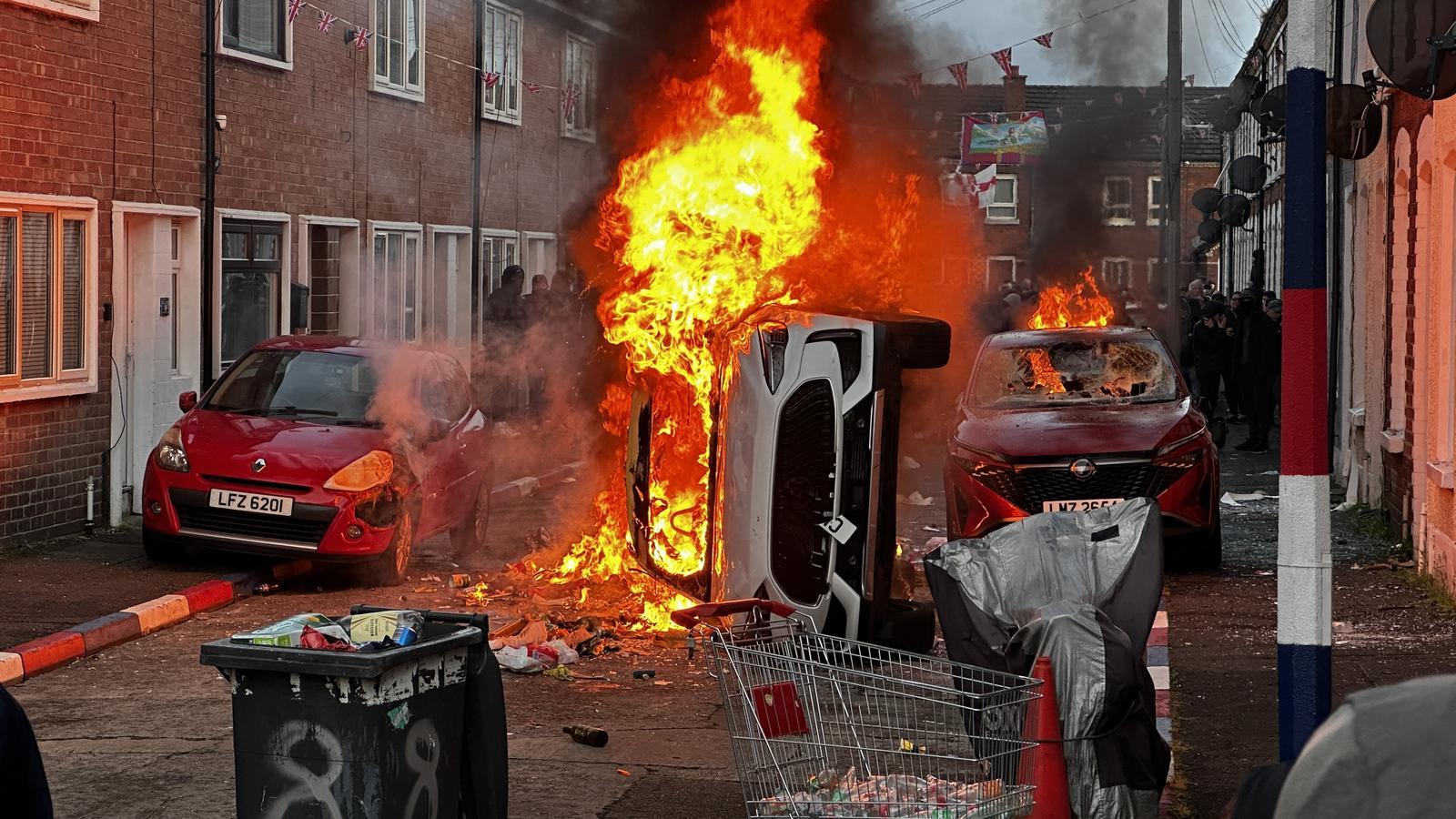 Vehicles set on fire by protesters on Lendrick Street in Belfast, as riots occurred in response to Monday night's stabbing attack in the city.