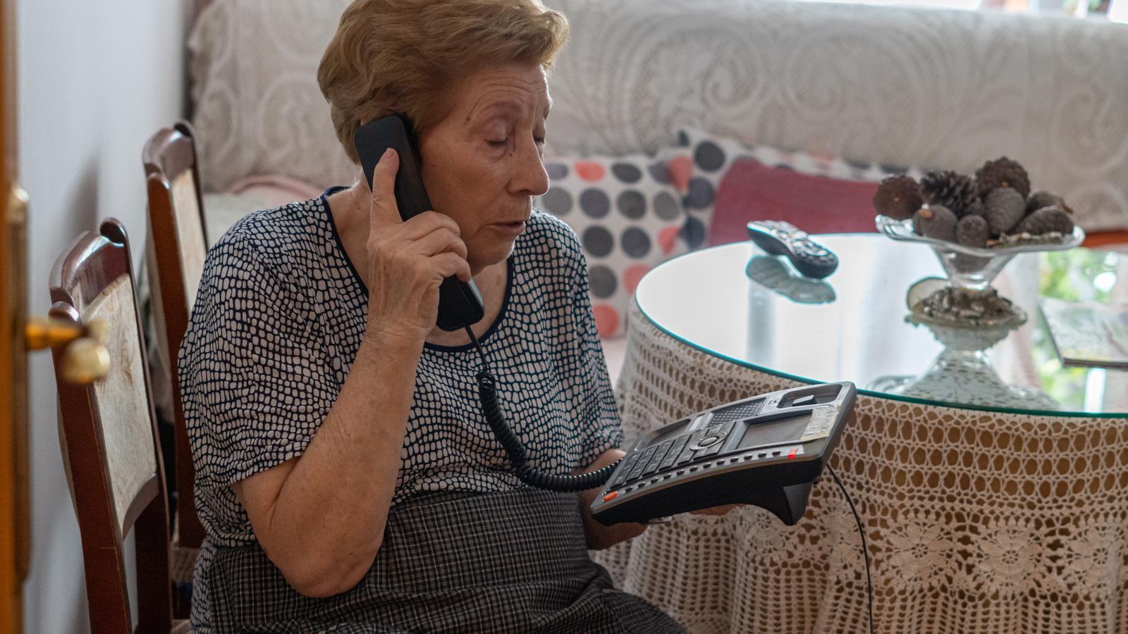 A woman calling in a stock image.
