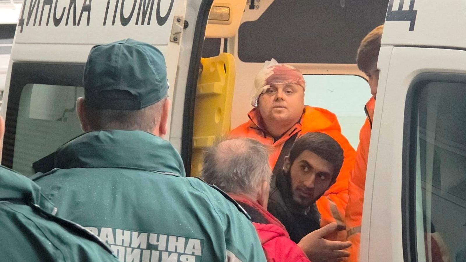 Crew members rescued from a ship damaged in a drone attack are transported by ambulance to Varna, Bulgaria, on October 13, 2026.
