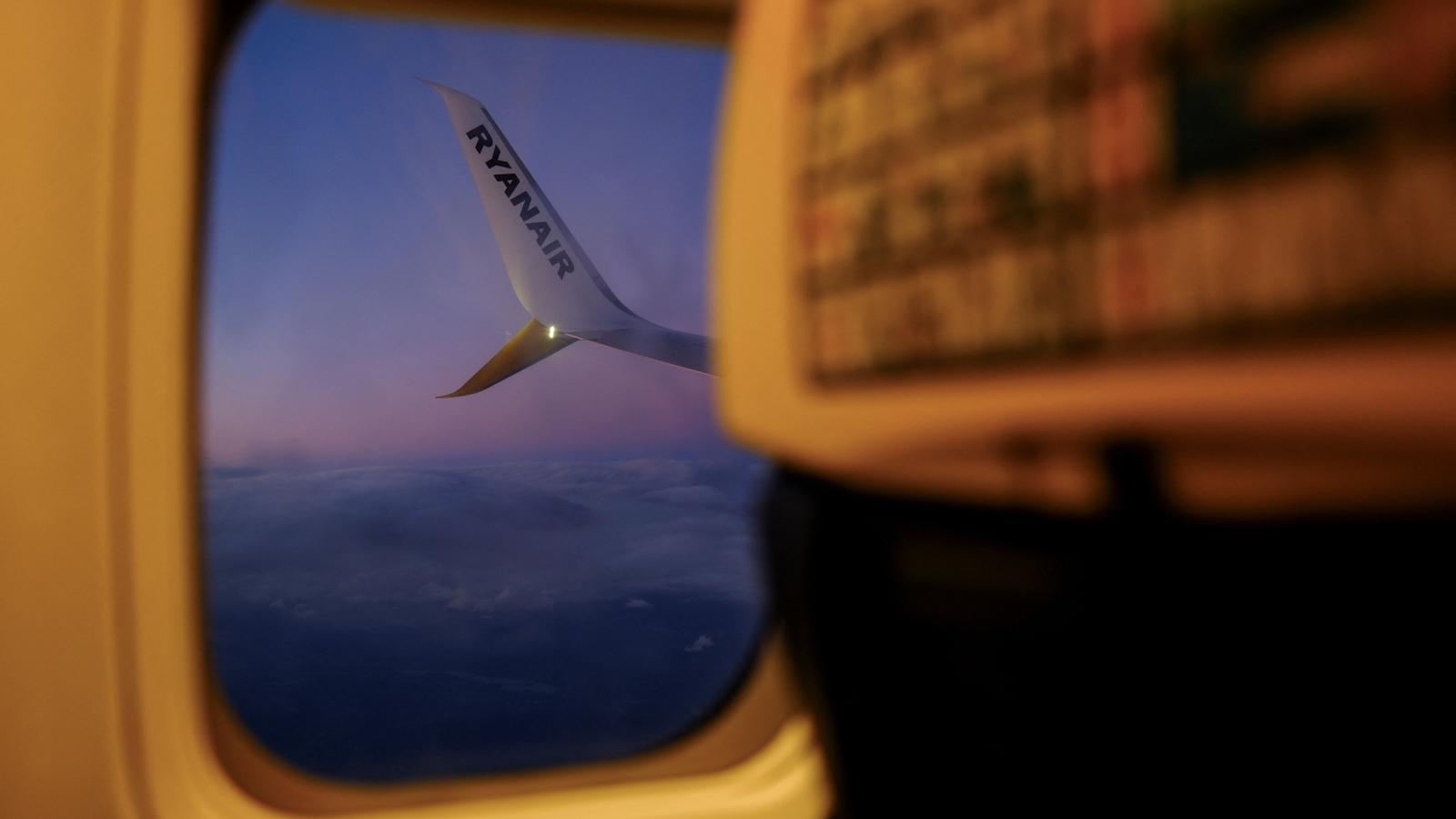 View from the inside of a Ryanair airplane that has just taken off from El Prat airport