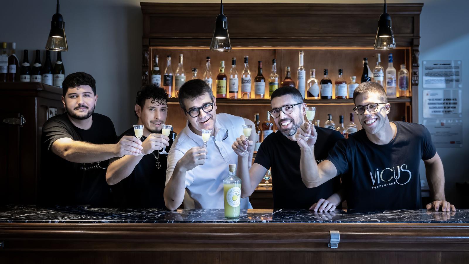 Guillem, Johny, Damià, Gerard and Pablo toasting with Llimonelu that is made at the Vicus restaurant.