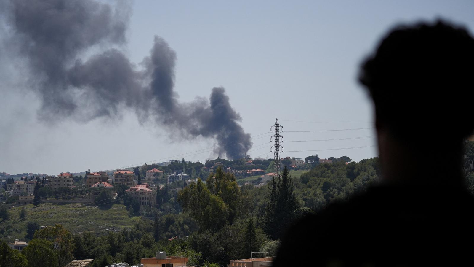 A column of smoke rises in the Lebanese city of Kfar Tebnit, after an attack by Israel.
