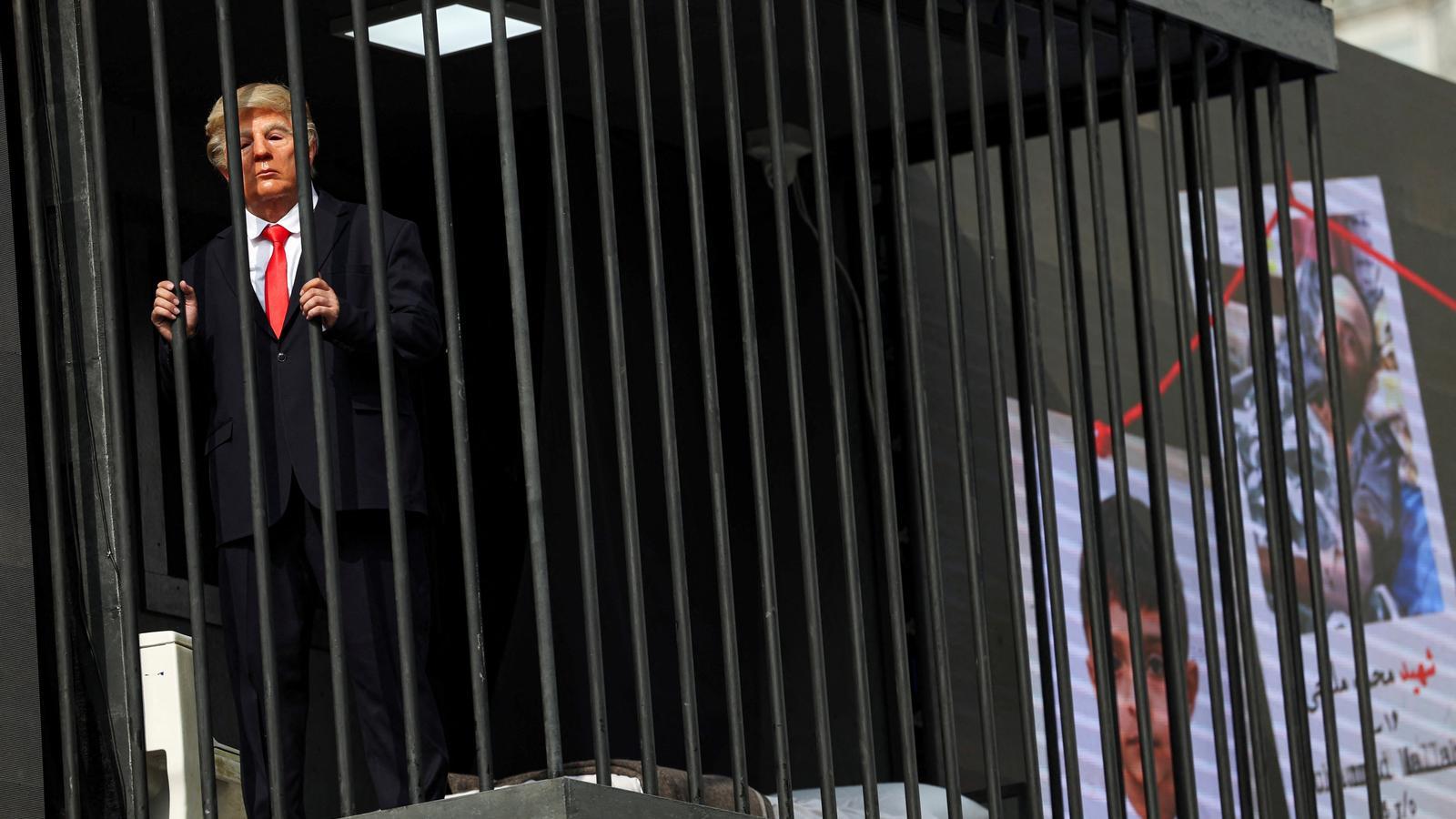 A caricature of Trump, imprisoned in one of the most crowded squares of the Iranian capital.